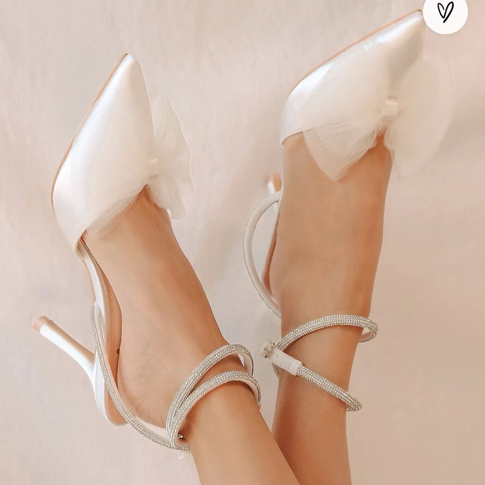 White pointed toe heels